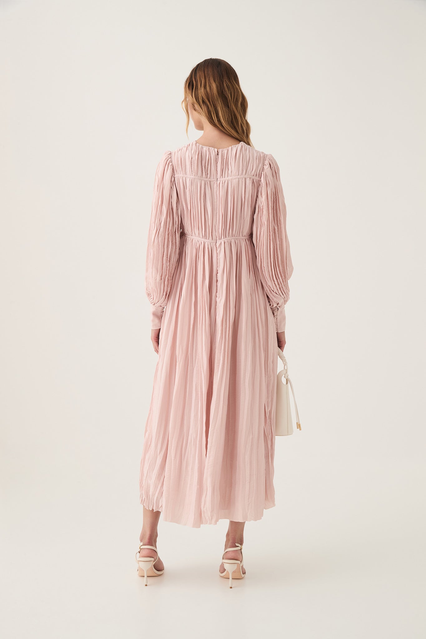 aje solstice pleated midi dress Aje Solstice Pleated Midi // Size 10 // Hire $120 This beautiful dress in a dusty blue has the finest of pleats which fall beautifully around the body, with shoulder pads and