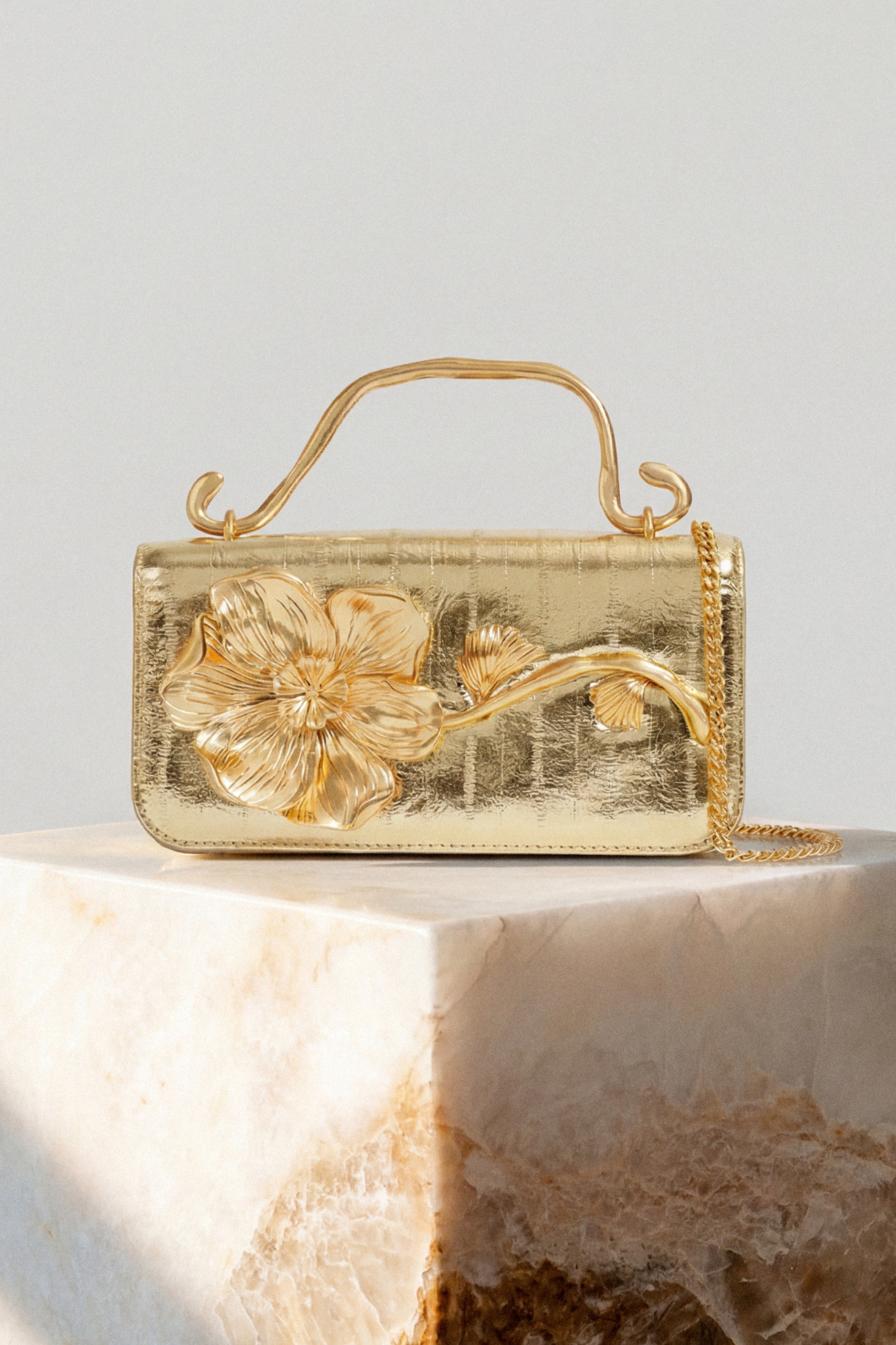 Celeste Emboss Flower Clutch