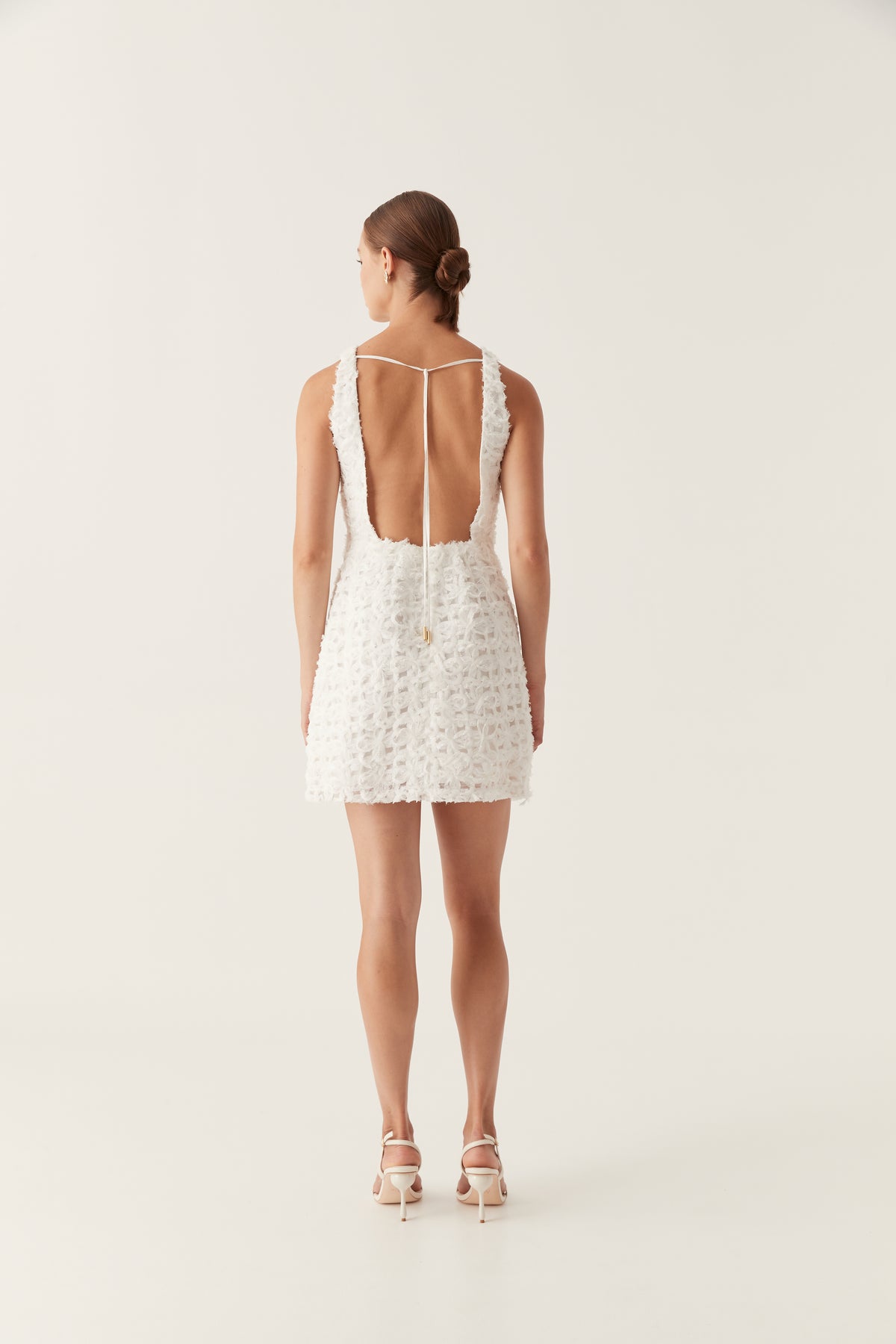 textured jersey cut-out a-line mini dress in ivory Quintette – Aje International line silhouette with a
